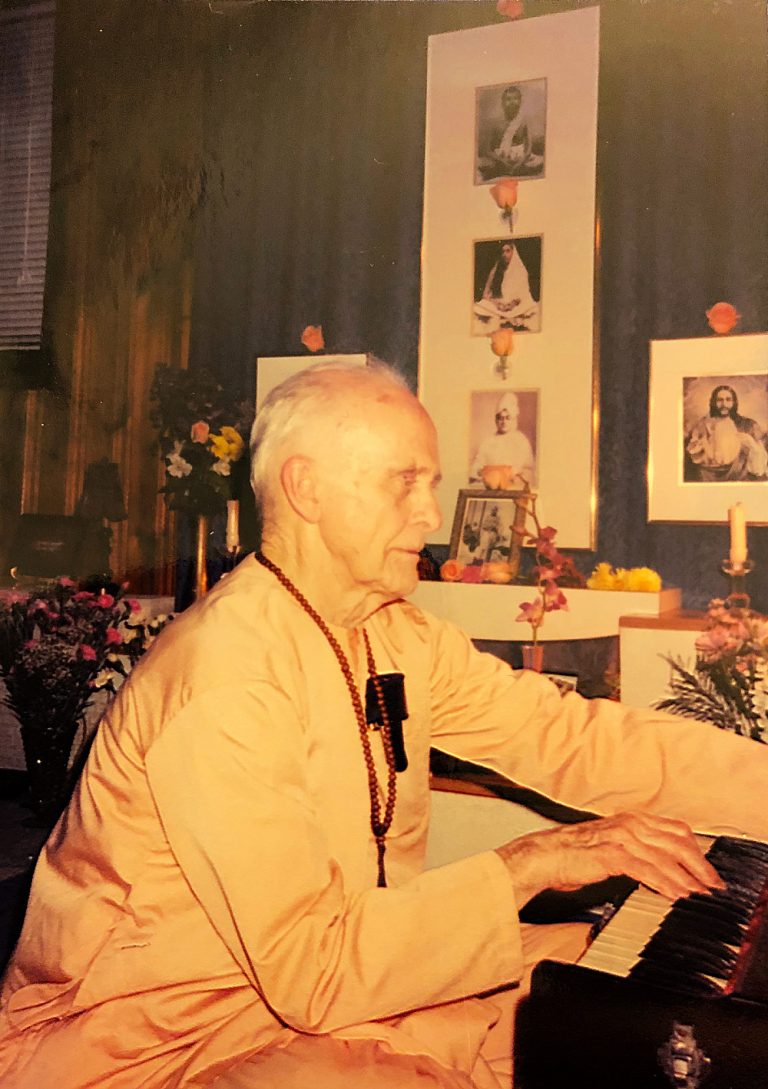 Swami playing harmonium, Tucker Center (submitted by Laurie Findlay)